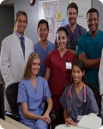 A group of doctors and nurses posing for the camera.