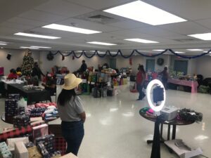 A room filled with lots of items and people.